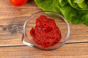 Tomato puree sauce for cooking photo