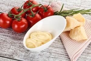 Cheese sauce in the bowl photo