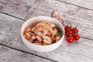 Raw peeled prawn in the bowl photo
