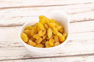 Yellow raisin - dry grape berries photo