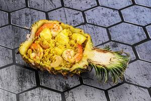 Thai cuisine - rice with prawn in pineapple photo