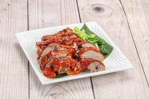 Asian cuisine - roasted duck with skin photo