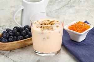 Yoghurt with granola and blueberry photo