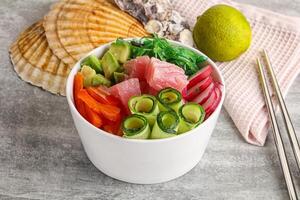 Hawaiian cuisine - poke with tuna and rice photo