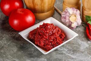 Natural organic red tomato paste photo