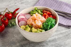 Hawaian cuisine - Poke with cocktail shrimps photo