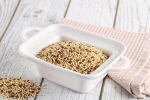 Raw dry quinoa cereal grain photo
