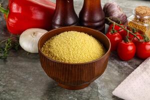 Raw dry wheat couscous grain photo