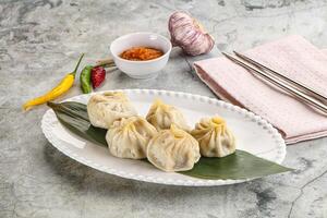 Chinese traditional steamed dumpligs momo photo