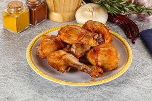 Raw marinated chicken drumstick for cooking photo