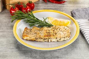 Baked salmon fish served rosemary photo