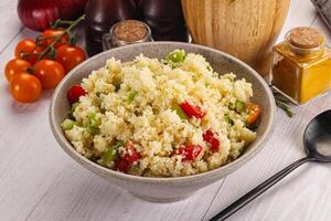 Vegan cuisine couscous with vegetables photo