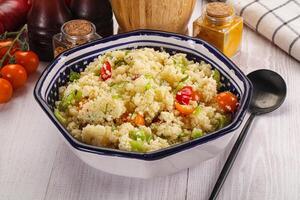 Vegan cuisine couscous with vegetables photo