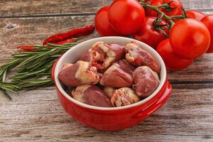 Raw chicken hearts for cooking photo