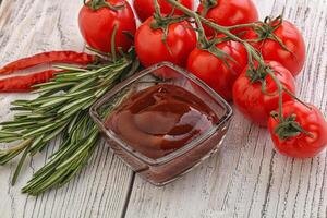 Tomato barbecue sauce on the bowl photo