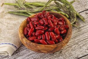 Baked red canned bean in the bowl photo