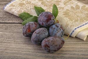 Ripe sweet tasty blue plum photo