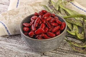 Baked red canned bean in the bowl photo