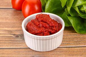 Tomato puree sauce for cooking photo