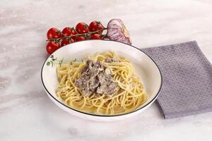 Pasta Carbonara with beef bacon photo