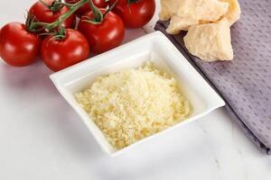 Shredded Italian hard parmesan cheese photo