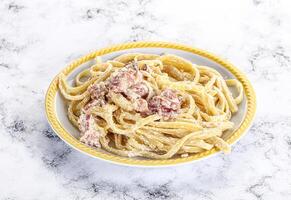 Classic pasta carbonara with bacon photo