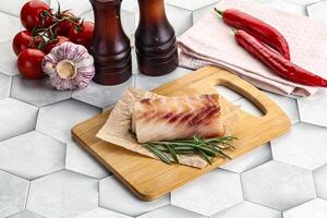 Raw cod fish steak for cooking photo