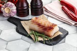 Raw cod fish steak for cooking photo