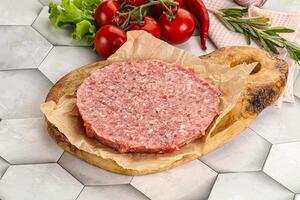 Raw beef uncooked burger cutlet photo