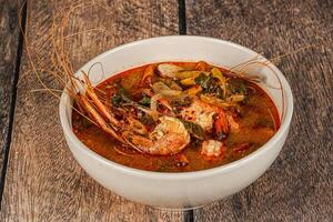 Thai traditional cuisine - Tom Yum soup photo