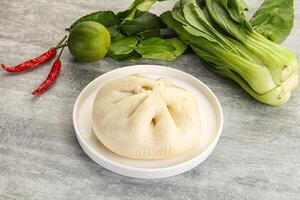 Chinese steamed bun Dim sum photo