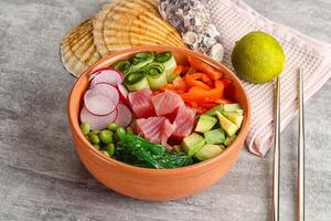 Hawaiian cuisine - poke with tuna and rice photo