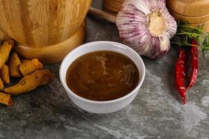 Indian curry sauce in the bowl photo