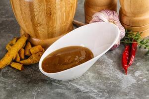 Indian curry sauce in the bowl photo