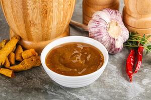 Indian curry sauce in the bowl photo