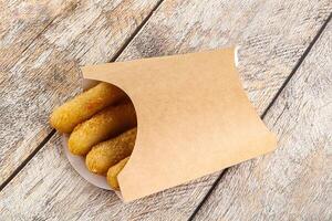 Breaded cheese sticks snack appetizer photo