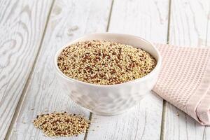 Raw dry quinoa cereal grain photo