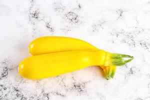 Yellow young zucchini for cooking photo