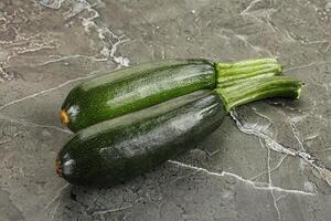 Sliced raw young green zucchini photo