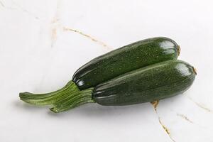 Sliced raw young green zucchini photo