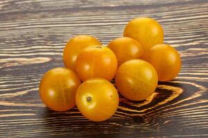 Ripe tasty yellow cherry tomato photo