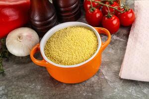 Raw dry wheat couscous grain photo