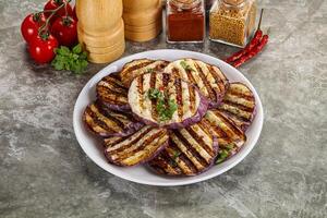 Grilled eggplant slices with cilantro photo