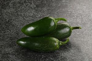 Raw green Mexican jalapeno pepper photo