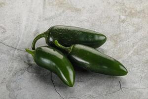 Raw green Mexican jalapeno pepper photo
