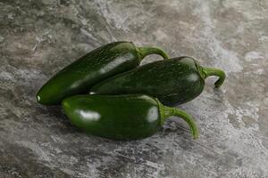 Raw green Mexican jalapeno pepper photo