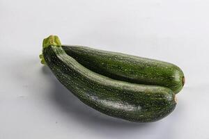 Raw young small green zucchini photo