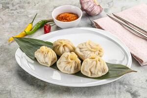 Chinese traditional steamed dumpligs momo photo