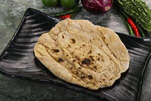 Indian traditional tandori bread - Roti photo