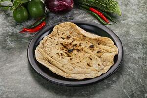 Indian traditional tandori bread - Roti photo